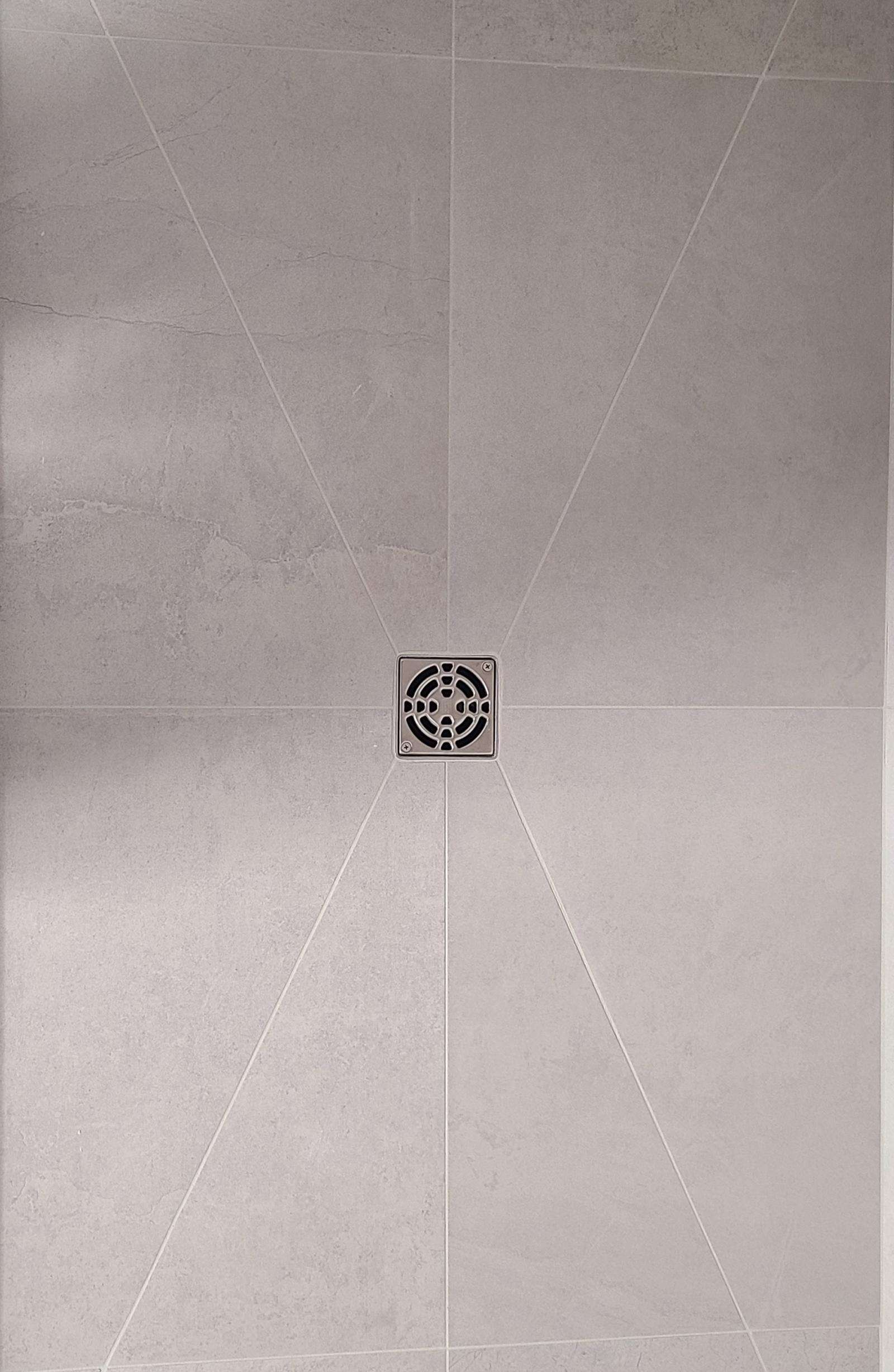 Custom Tile Work For Bathroom Drain Flooring
