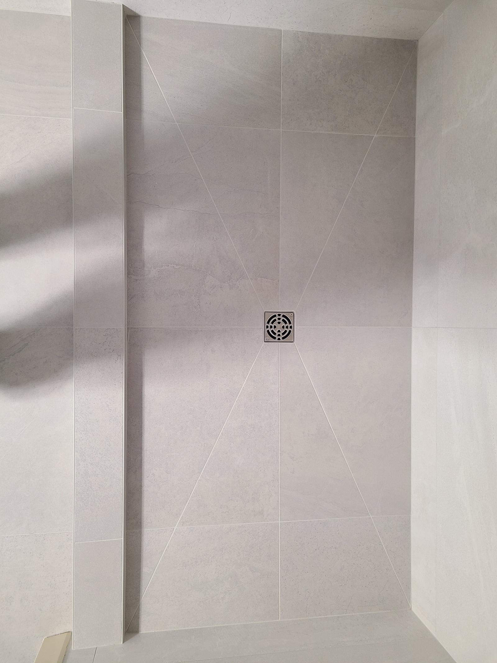Custom Tile Work For Bathroom Drain Flooring